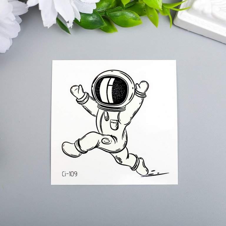 Наклейка-тату фосфорная "Космонавт в невесомости" 6х6 см