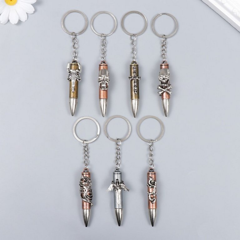 Брелок "Пуля с фигуркой" МИКС  6,4х1,6х1,3 см (металл)