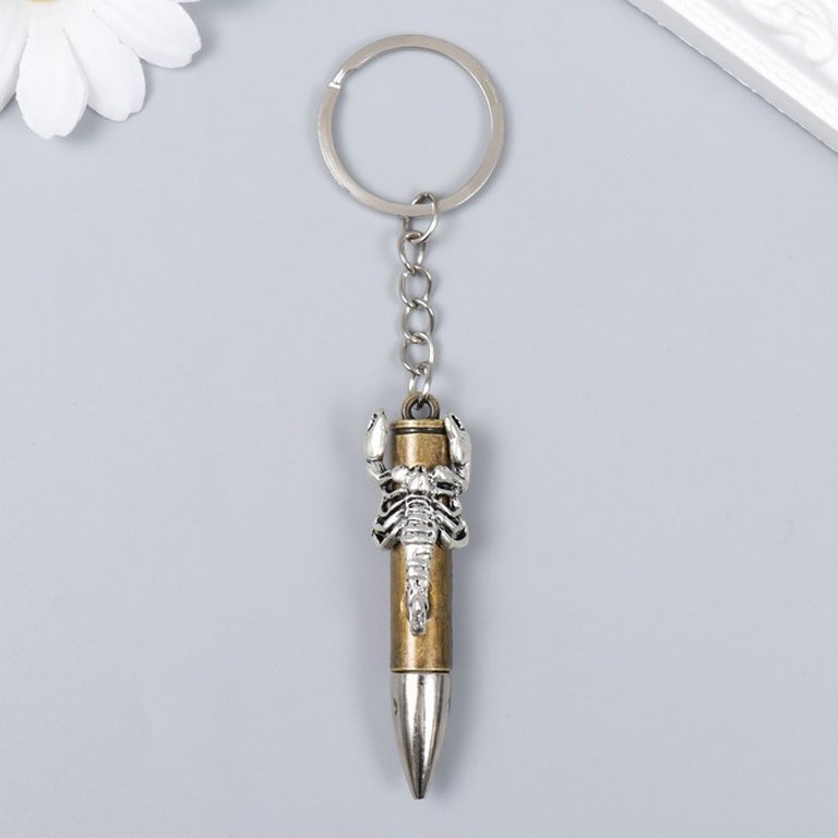 Брелок "Пуля с фигуркой" МИКС  6,4х1,6х1,3 см (металл)